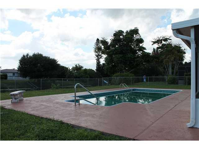 22369 Boulder Street Boca Raton, FL 33428 - Photo 4 of 15 a garden view with a seating space