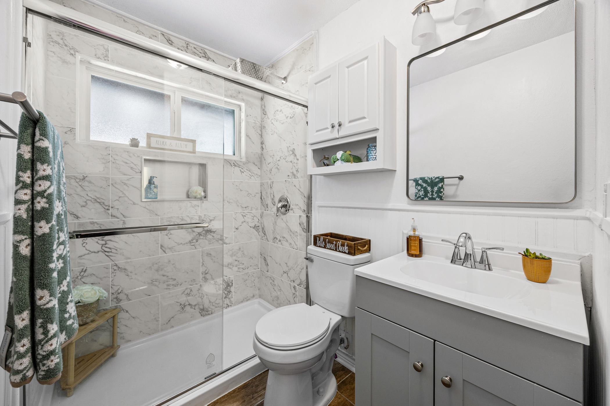 6010 Waycross Drive Austin, TX 78745 - Photo 16 of 22 a bathroom with a sink toilet and shower