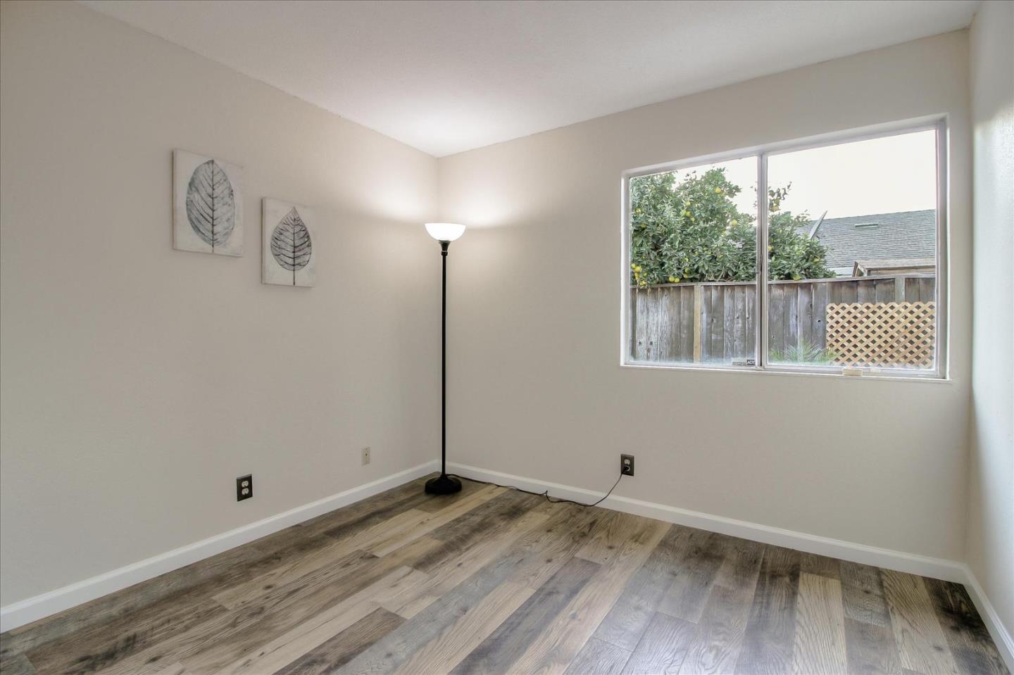 5278 Garrison Circle San Jose, CA 95123 - Photo 18 of 31 a view of empty room with wooden floor and fan