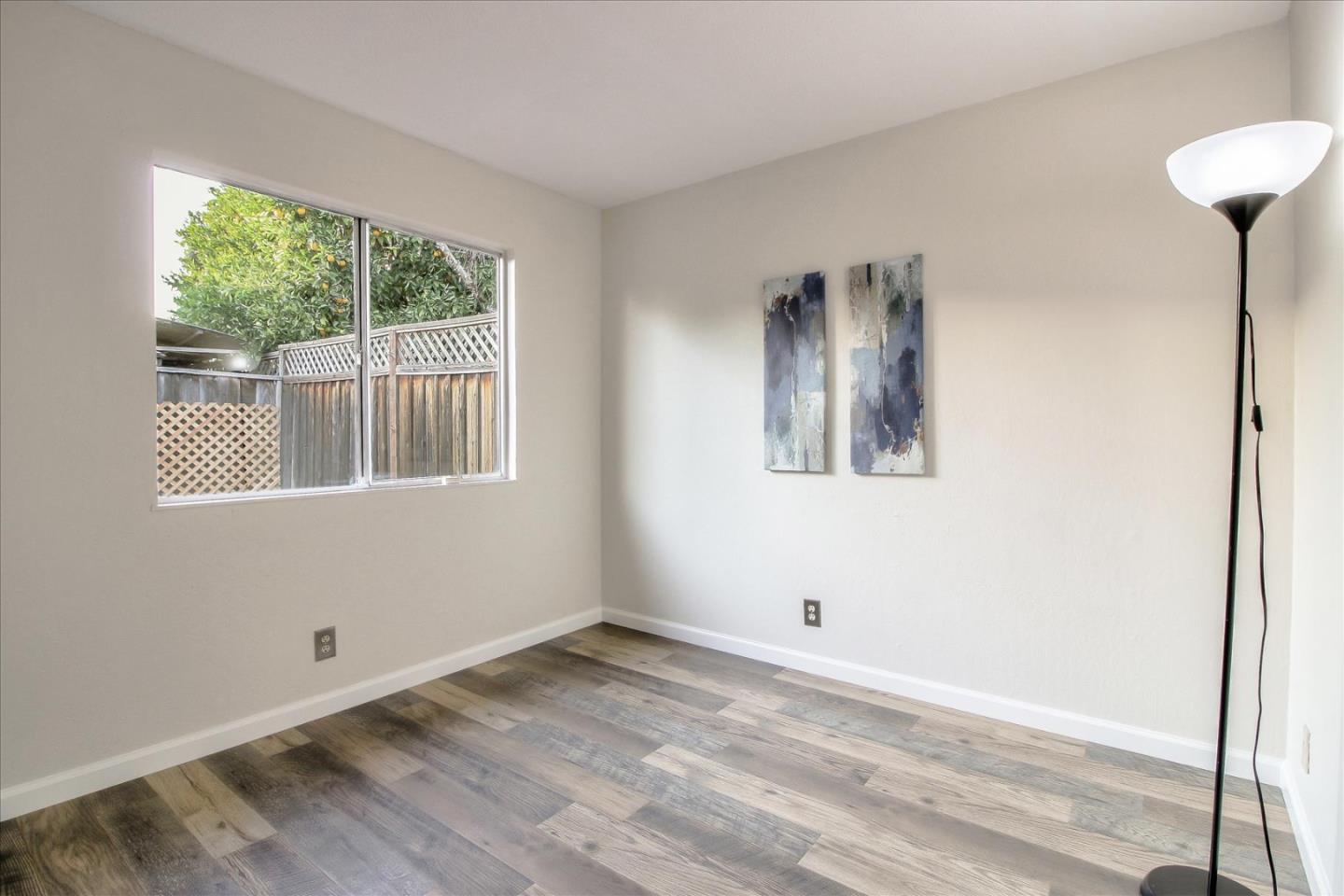 5278 Garrison Circle San Jose, CA 95123 - Photo 19 of 31 a view of empty room with wooden floor