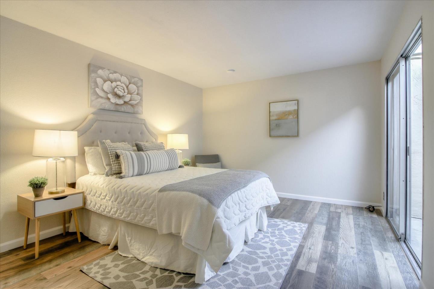 5278 Garrison Circle San Jose, CA 95123 - Photo 21 of 31 a bedroom with a bed and lamp