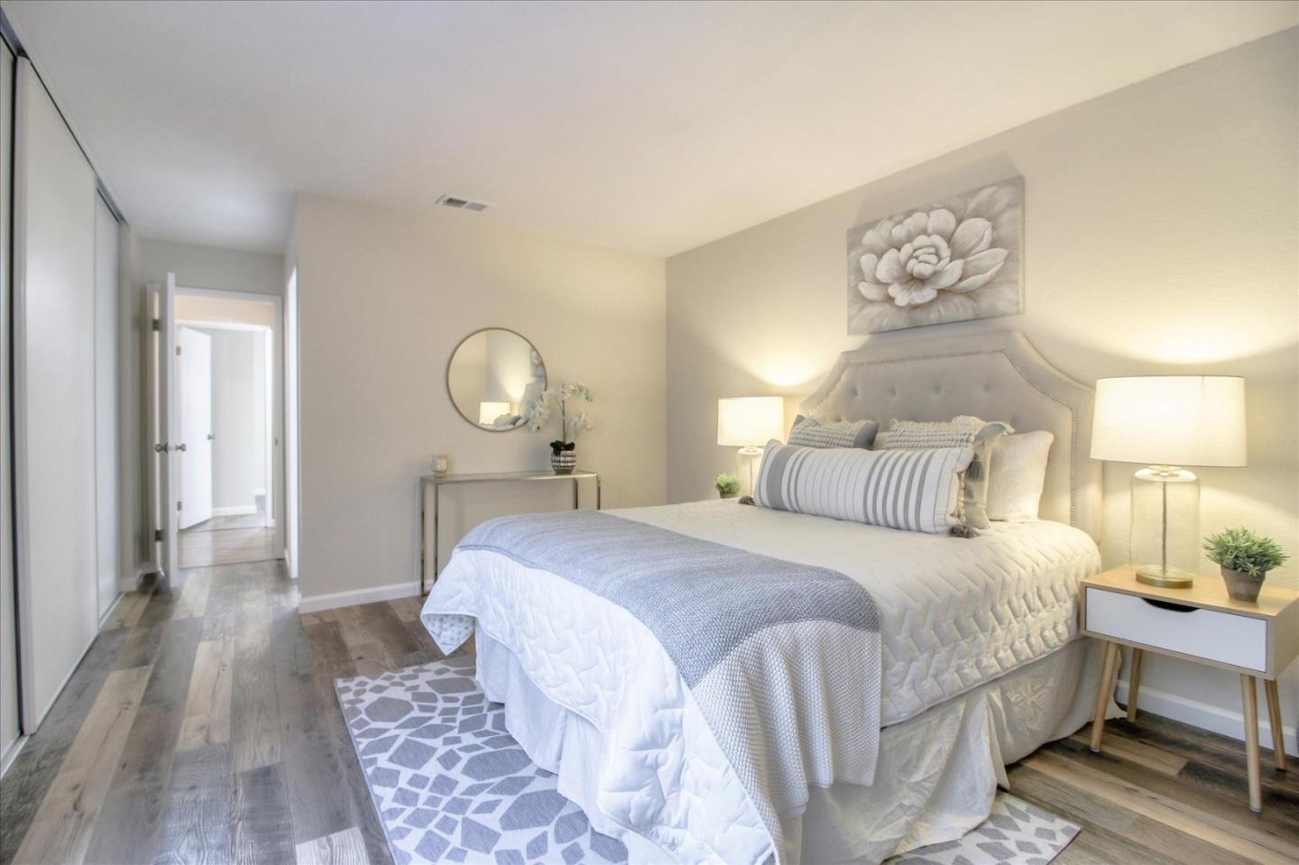 5278 Garrison Circle San Jose, CA 95123 - Photo 23 of 31 a bedroom with a bed and wooden floor