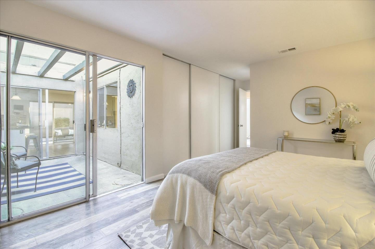 5278 Garrison Circle San Jose, CA 95123 - Photo 24 of 31 a bedroom with a bed and a large window with outer view