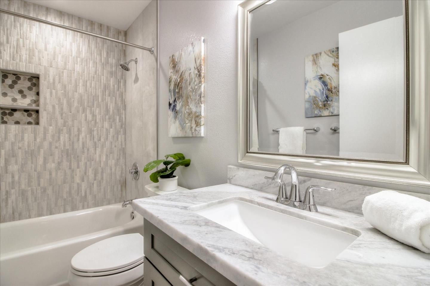 5278 Garrison Circle San Jose, CA 95123 - Photo 25 of 31 a bathroom with a granite countertop sink a toilet and a bathtub