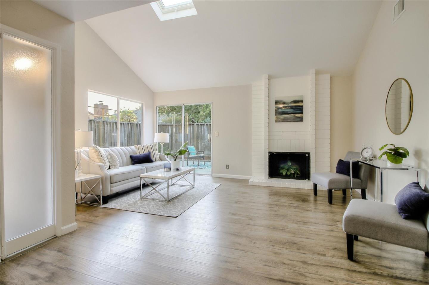 5278 Garrison Circle San Jose, CA 95123 - Photo 4 of 31 a living room with furniture and a fireplace