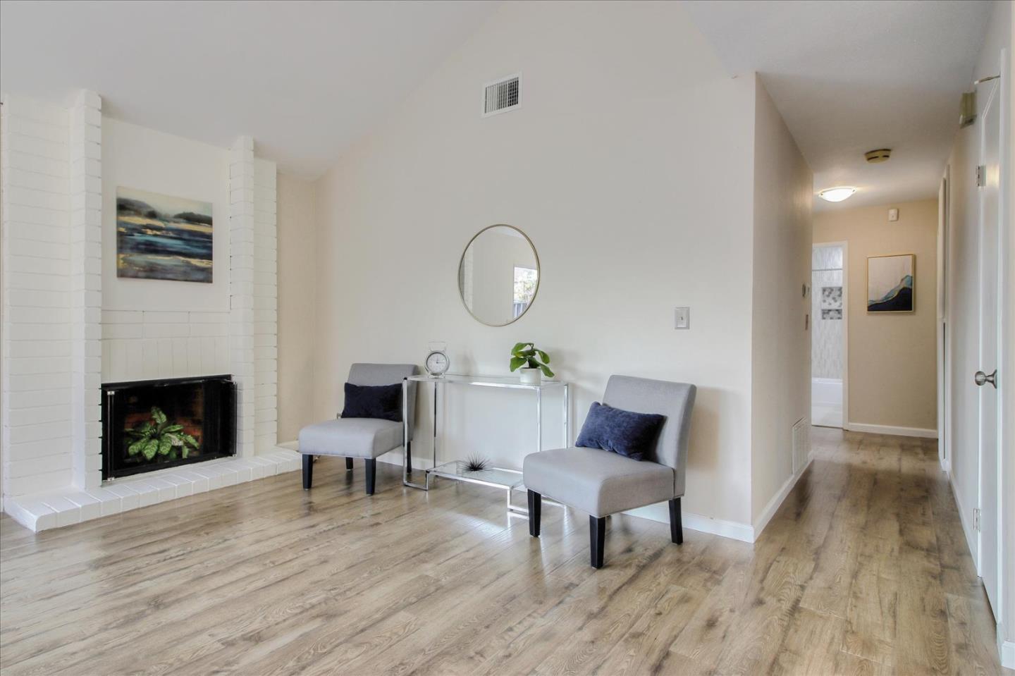 5278 Garrison Circle San Jose, CA 95123 - Photo 5 of 31 a living room with furniture and a fireplace