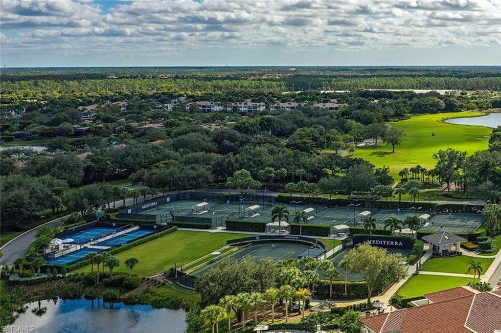 16755 Lucarno Way Naples, FL 34110 - Photo 44 of 50 a view of a lake with a city view