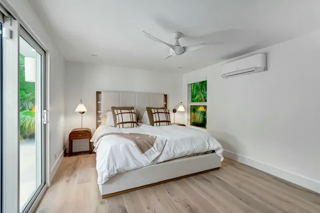 a bedroom with a bed and a cabinets