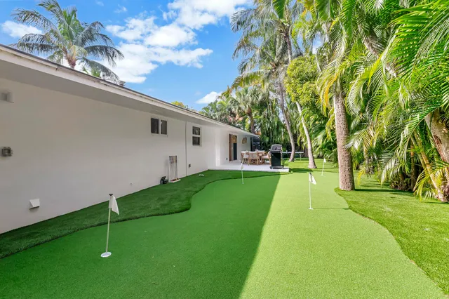 a house view with a garden space
