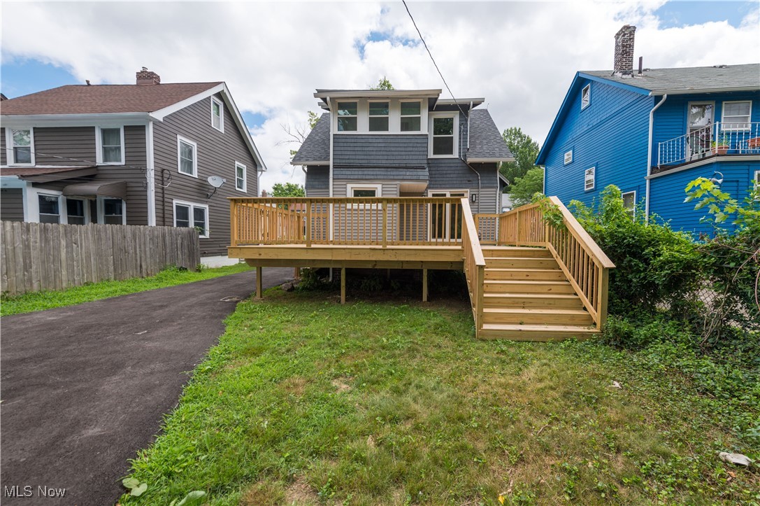 896 Selwyn Road Cleveland Heights, OH 44112 - Photo 20 of 23 Rear view of house featuring a wooden deck, stairs, and roof with shingles