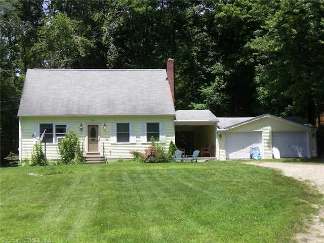 254 Judd Road Coventry, CT 06238 - Photo 1 of 1 a front view of house with yard and green space
