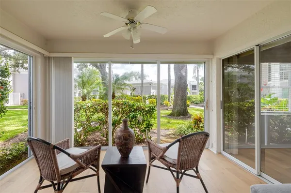 a view of a dining room with furniture window and outside view