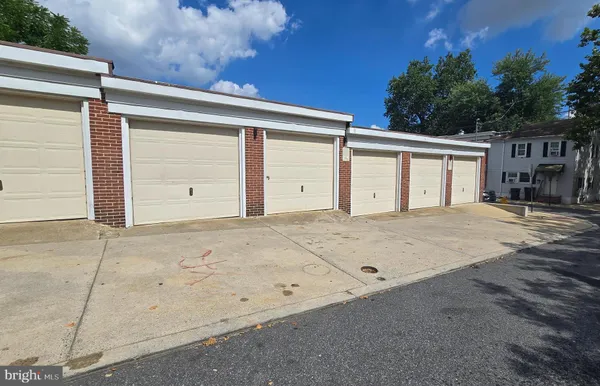 a front view of a house with a garage