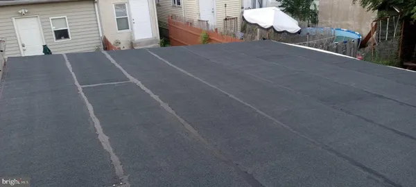 a view of a house with a street