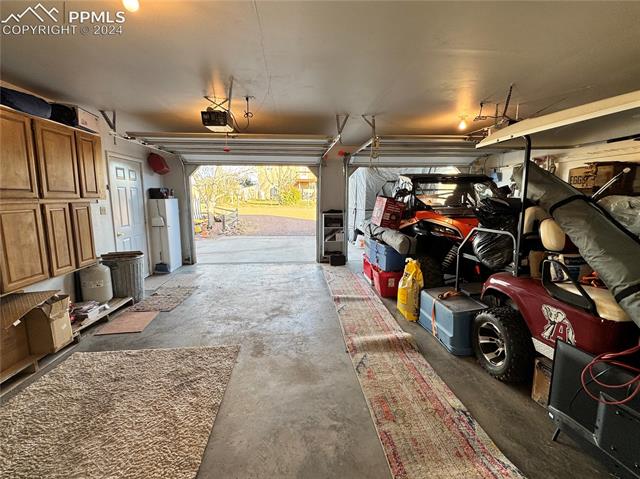 7 Bluff Road Florence, CO 81226 - Photo 2 of 29 Garage featuring a garage door opener