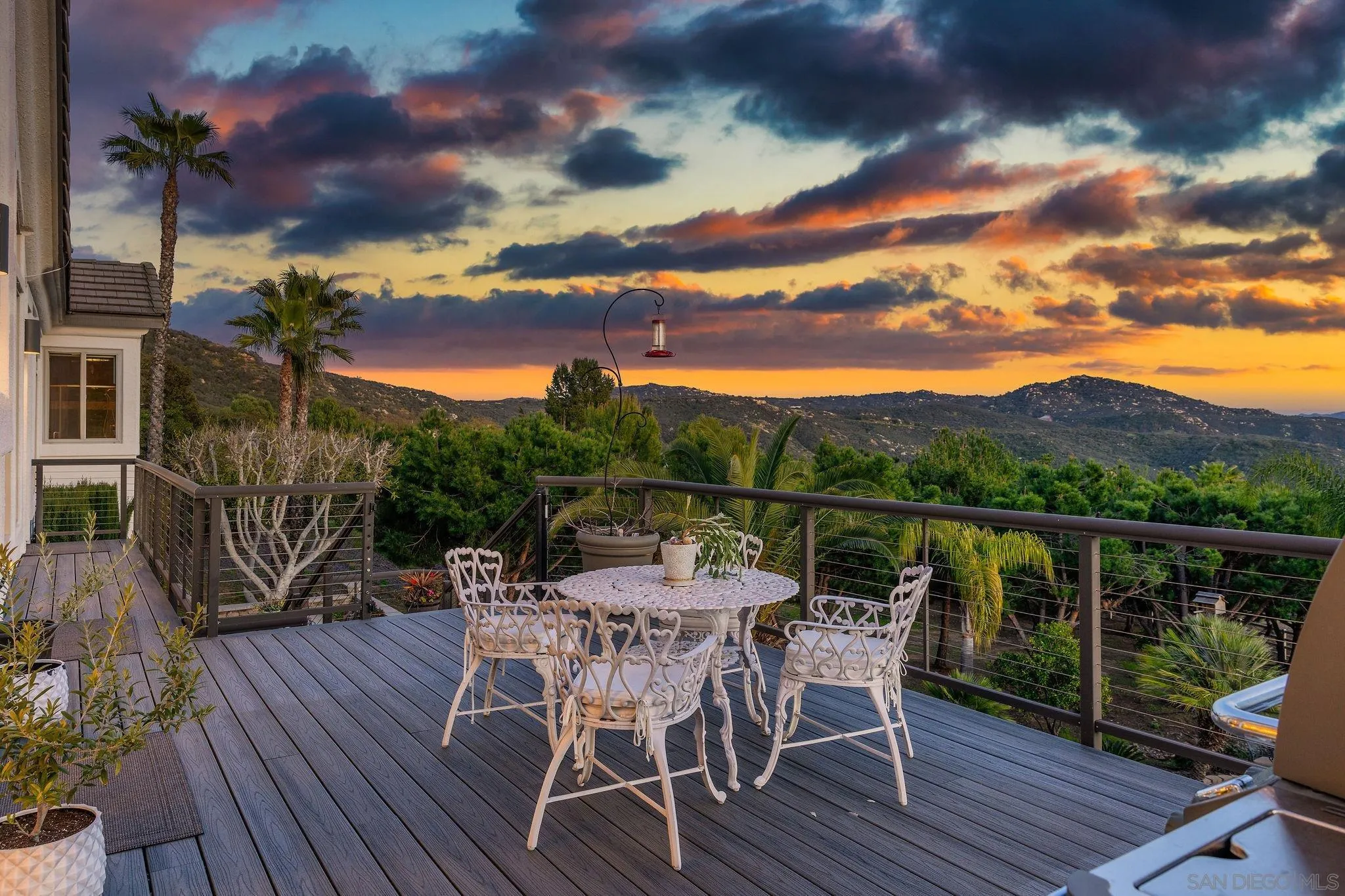 14220 Ridge Oak Place Valley Center, CA 92082 - Photo 54 of 59 a view of a balcony with furniture and wooden floor