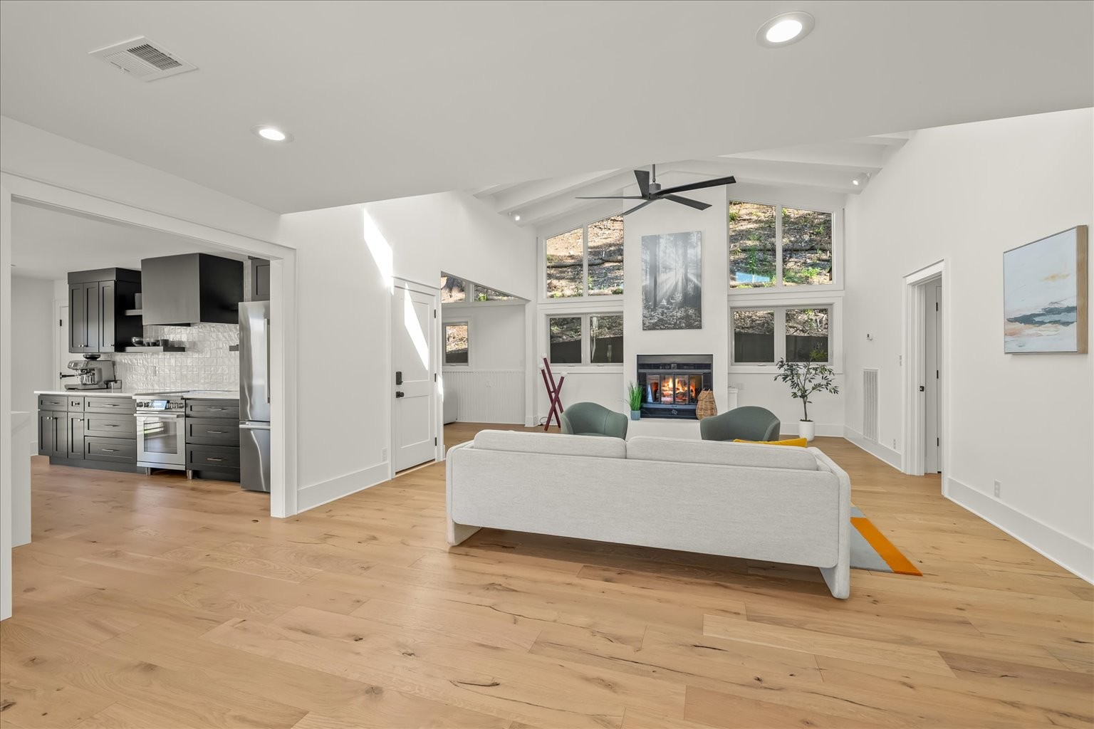 7407 Indian Creek Road Nashville, TN 37209 - Photo 12 of 48 a living room with furniture and a fireplace