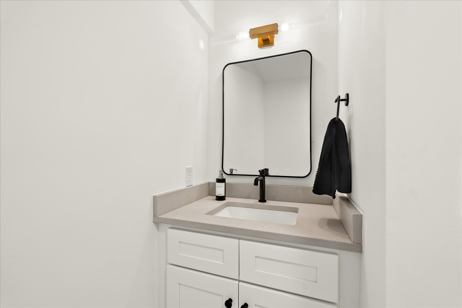 7407 Indian Creek Road Nashville, TN 37209 - Photo 24 of 48 a bathroom with a sink and a mirror