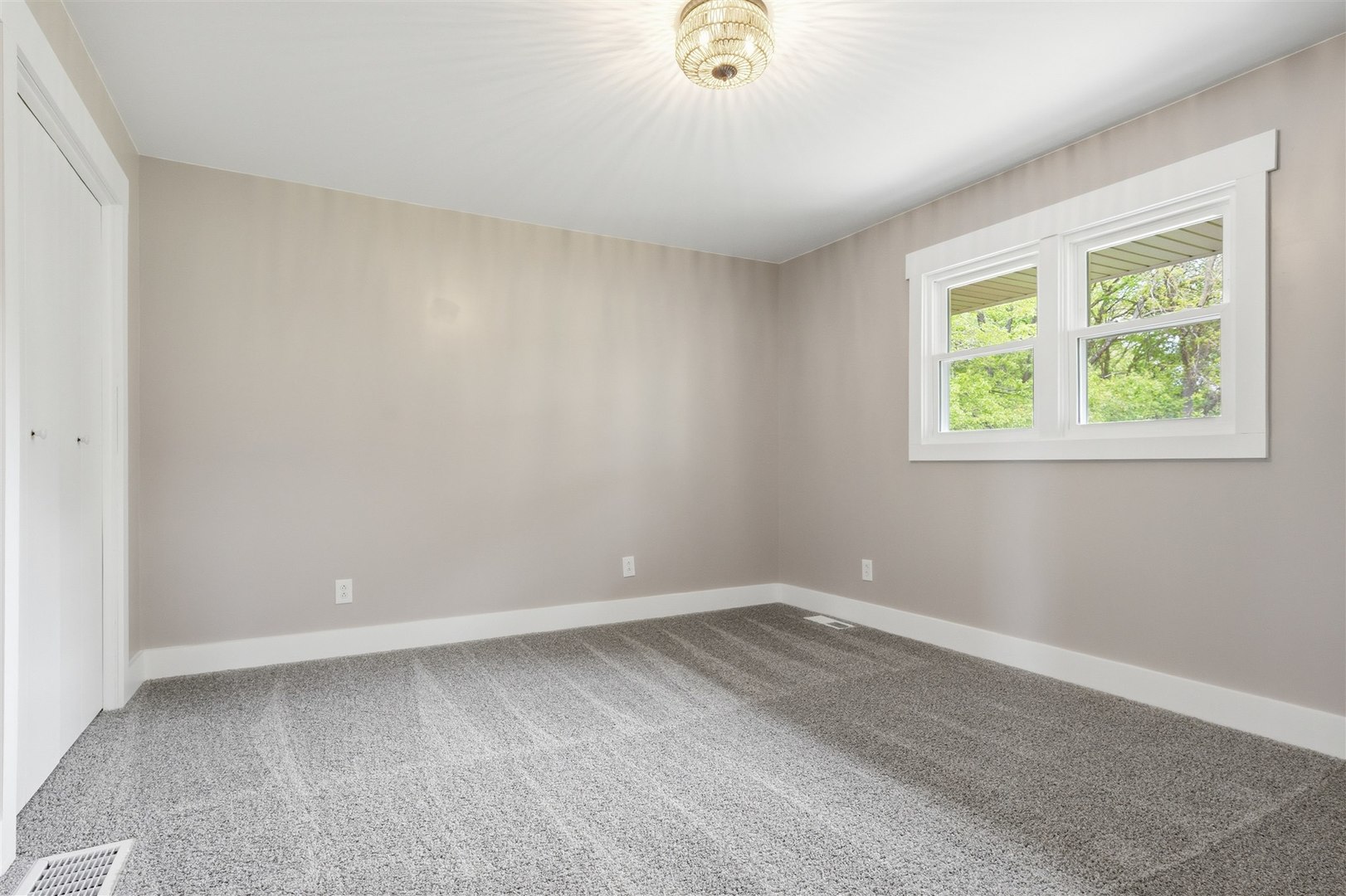 7277 East 3000 N Road Cornell, IL 61319 - Photo 11 of 40 an empty room with a window