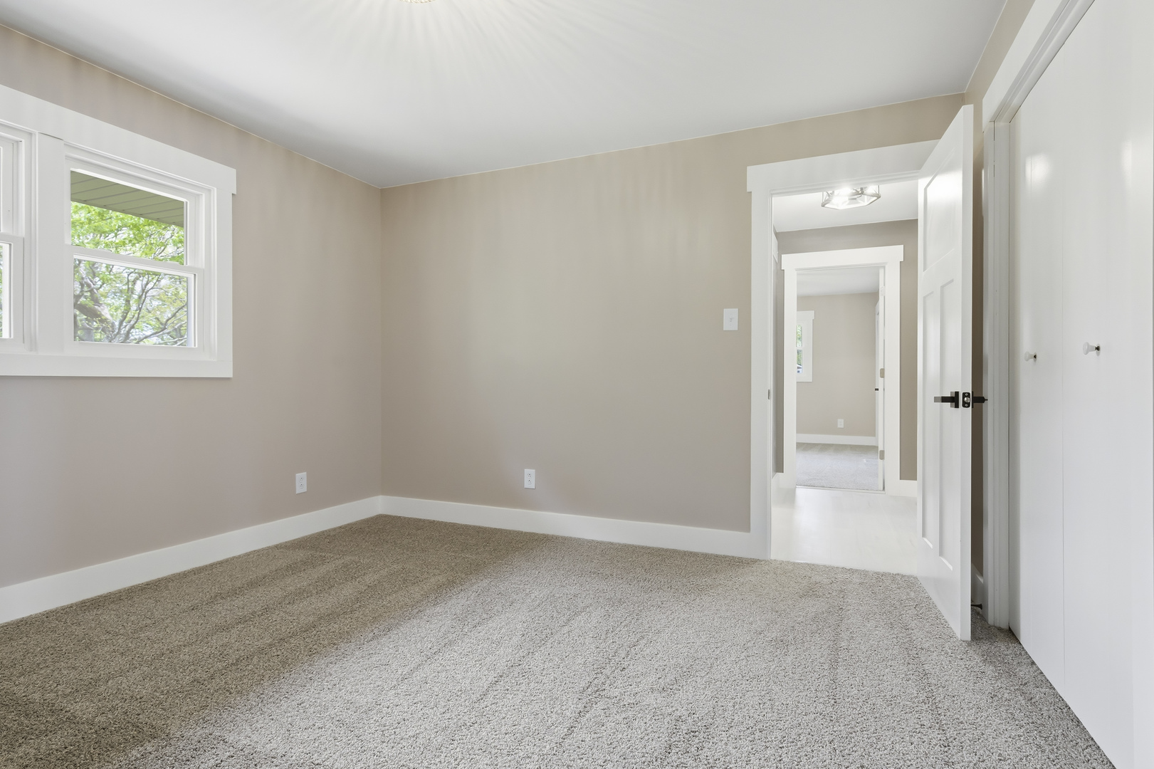 7277 East 3000 N Road Cornell, IL 61319 - Photo 12 of 40 a view of an empty room with window and closet area