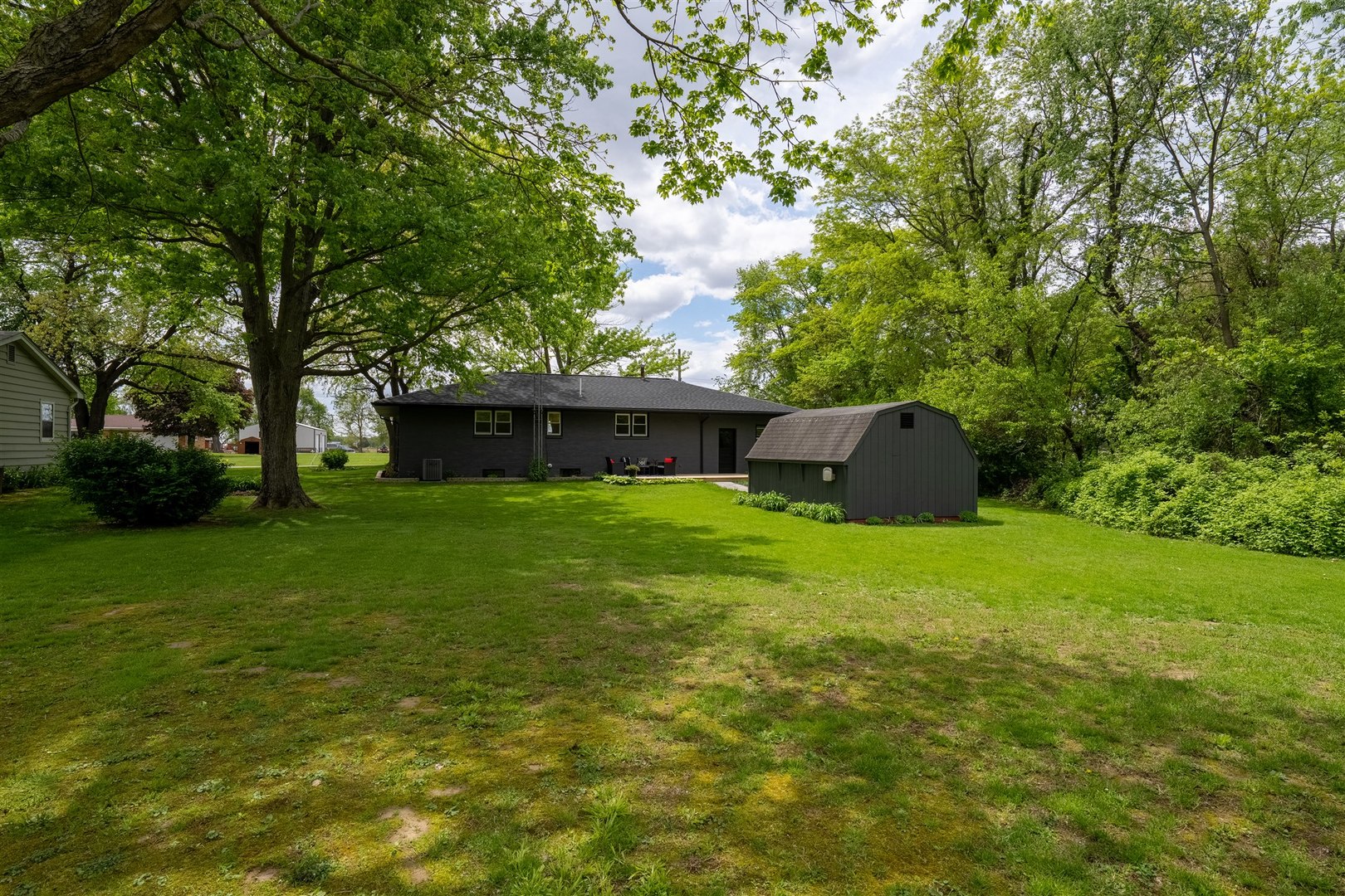 7277 East 3000 N Road Cornell, IL 61319 - Photo 29 of 40 a front view of house with a garden