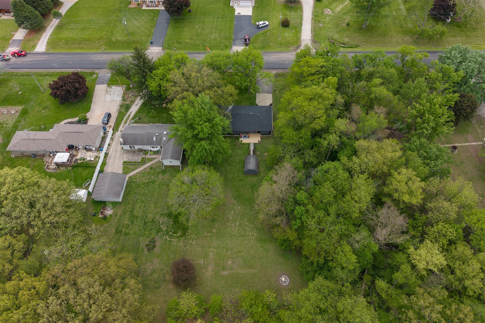 7277 East 3000 N Road Cornell, IL 61319 - Photo 33 of 40 an aerial view of a house with a yard