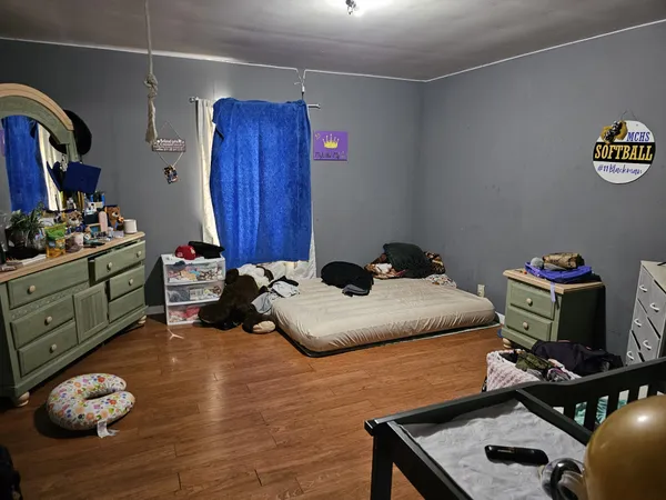 a room with furniture and gym equipment