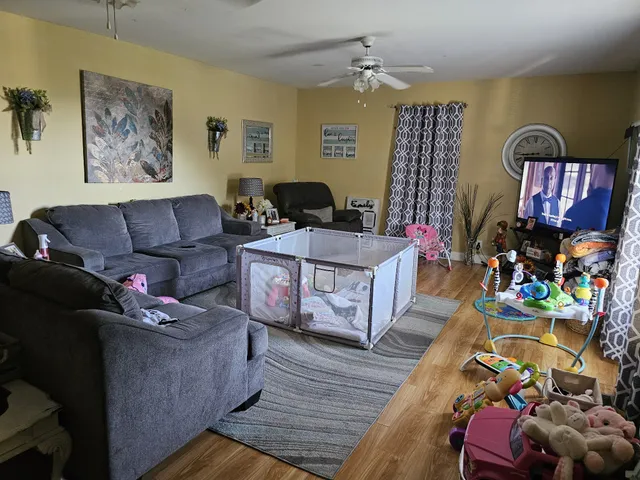 a living room with furniture and a couch