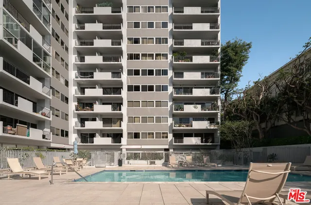 a front view of a building with street view