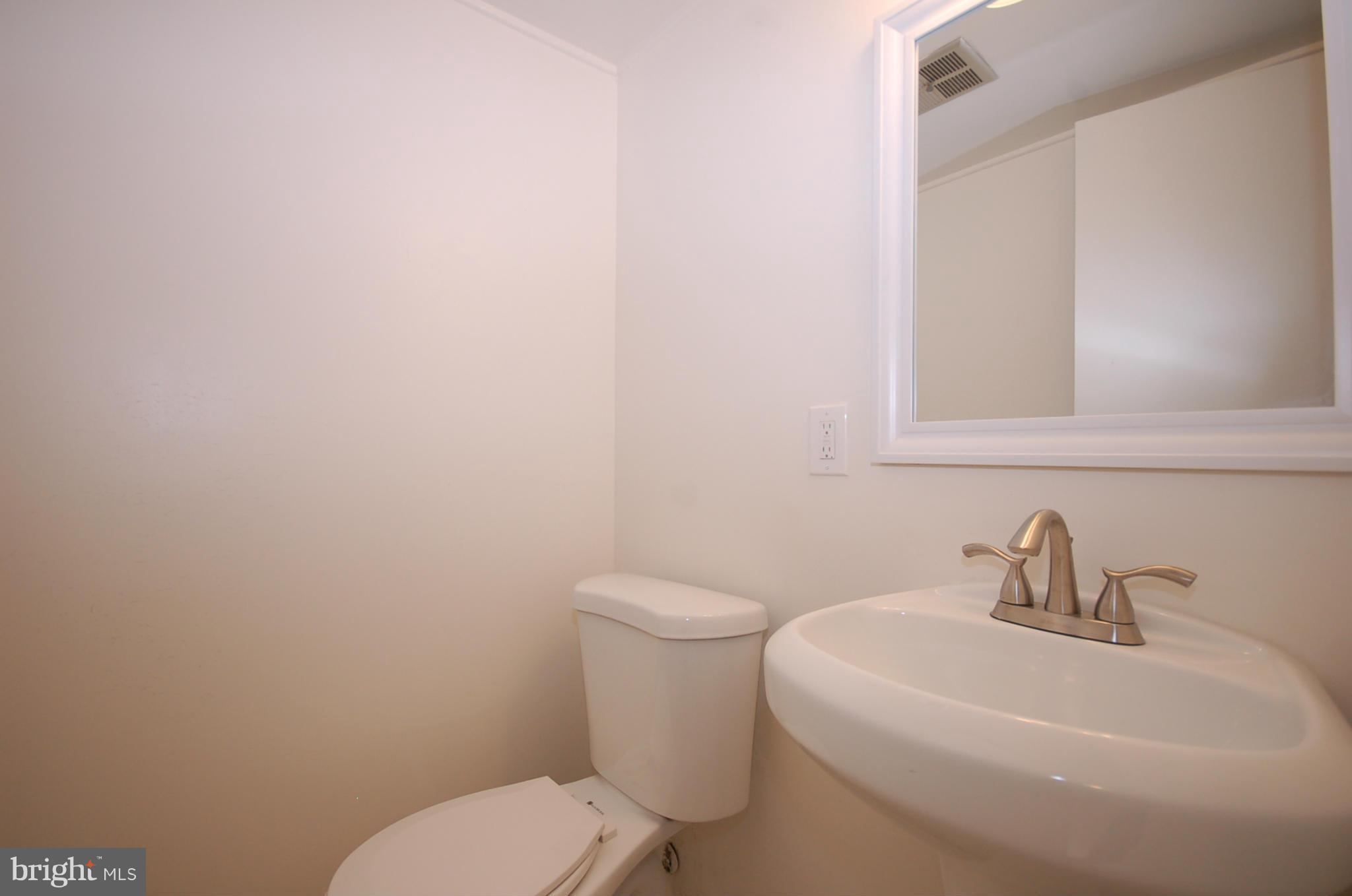 2366 Sun Valley Circle, Unit 2H Silver Spring, MD 20906 - Photo 10 of 16 Main floor powder room