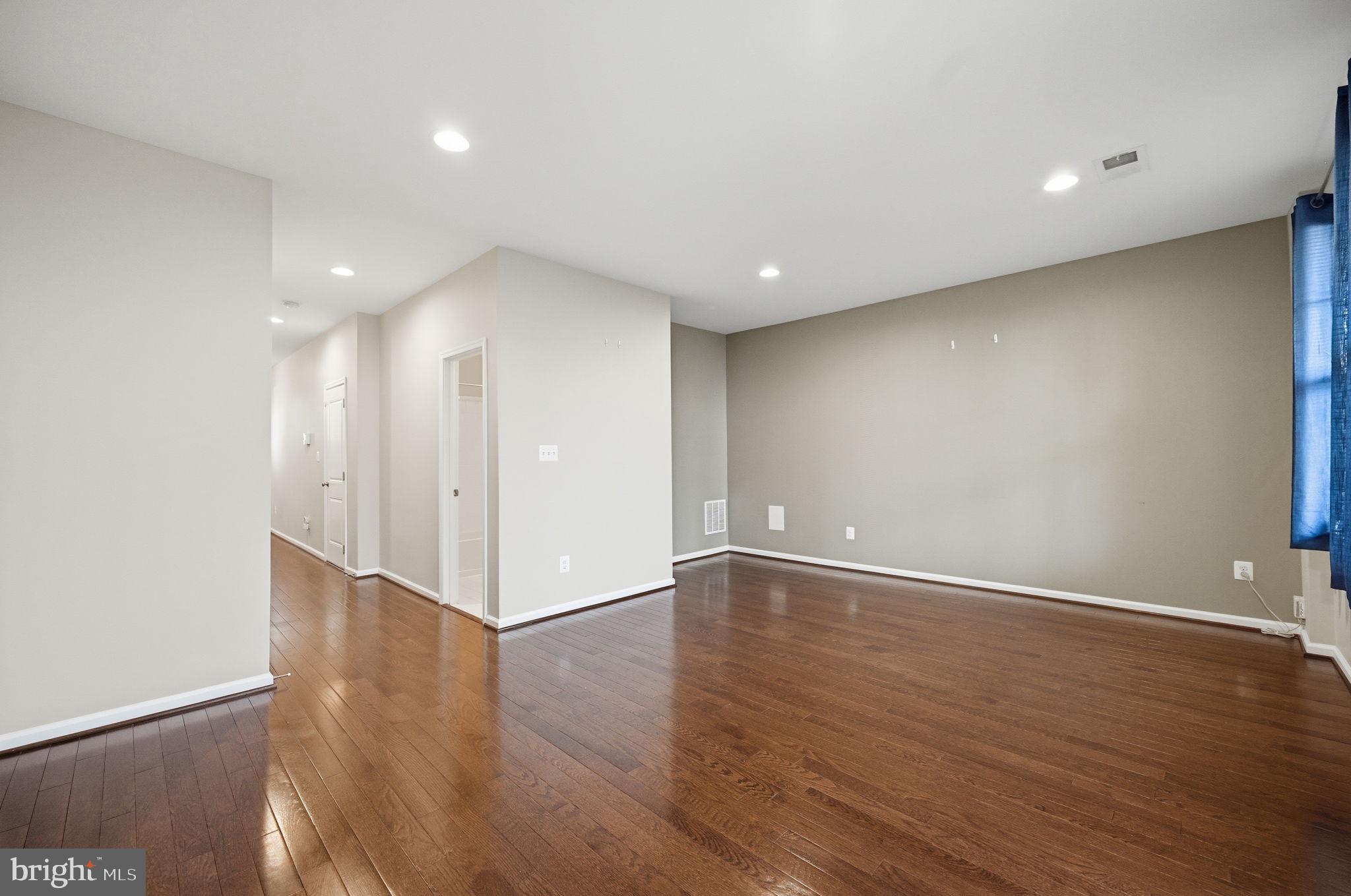 650 Aspen Road, Unit 108 Stafford, VA 22554 - Photo 9 of 26 Spacious, light-filled living area.
