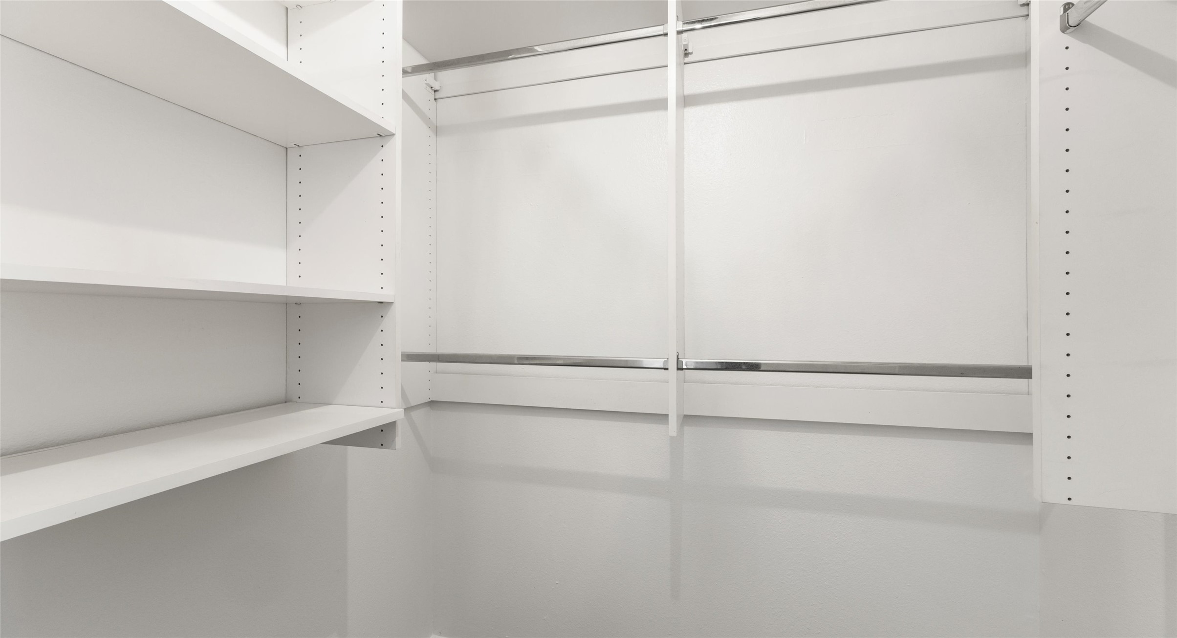 2918 Ranch Road 620 North, Unit C122 Austin, TX 78734 - Photo 20 of 36 This closet features built-in white shelving and chrome hanging rods