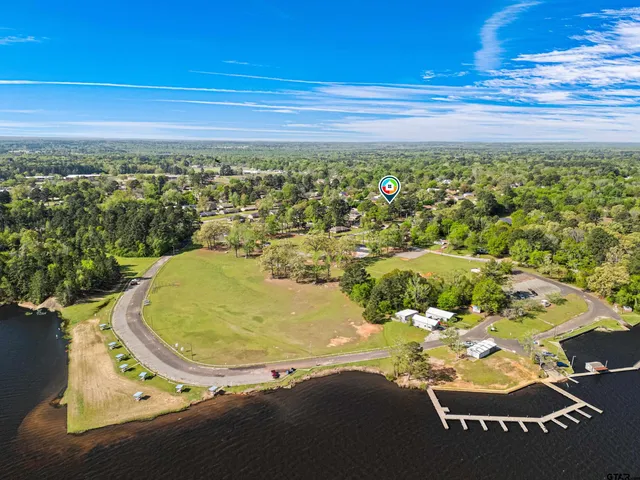 an aerial view of residential house with outdoor space