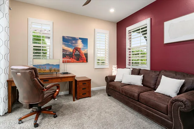 a view of livingroom with furniture and windows