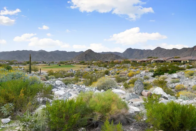 a front view of a building with a road