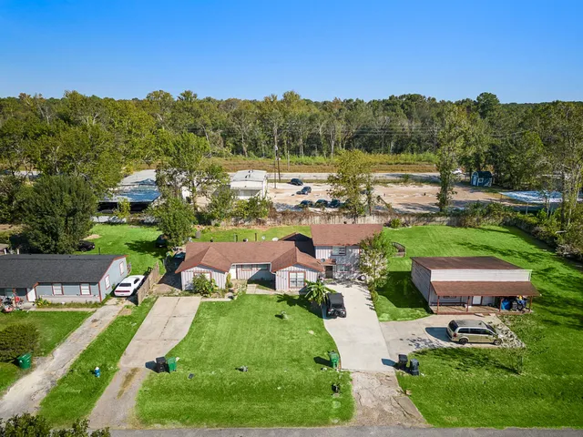 an aerial view of a house with garden
