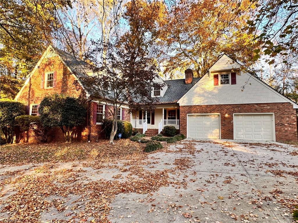 3415 Old Onslow Road Greensboro, NC 27407 - Photo 1 of 45 Front view of teh home w/cirlce drive