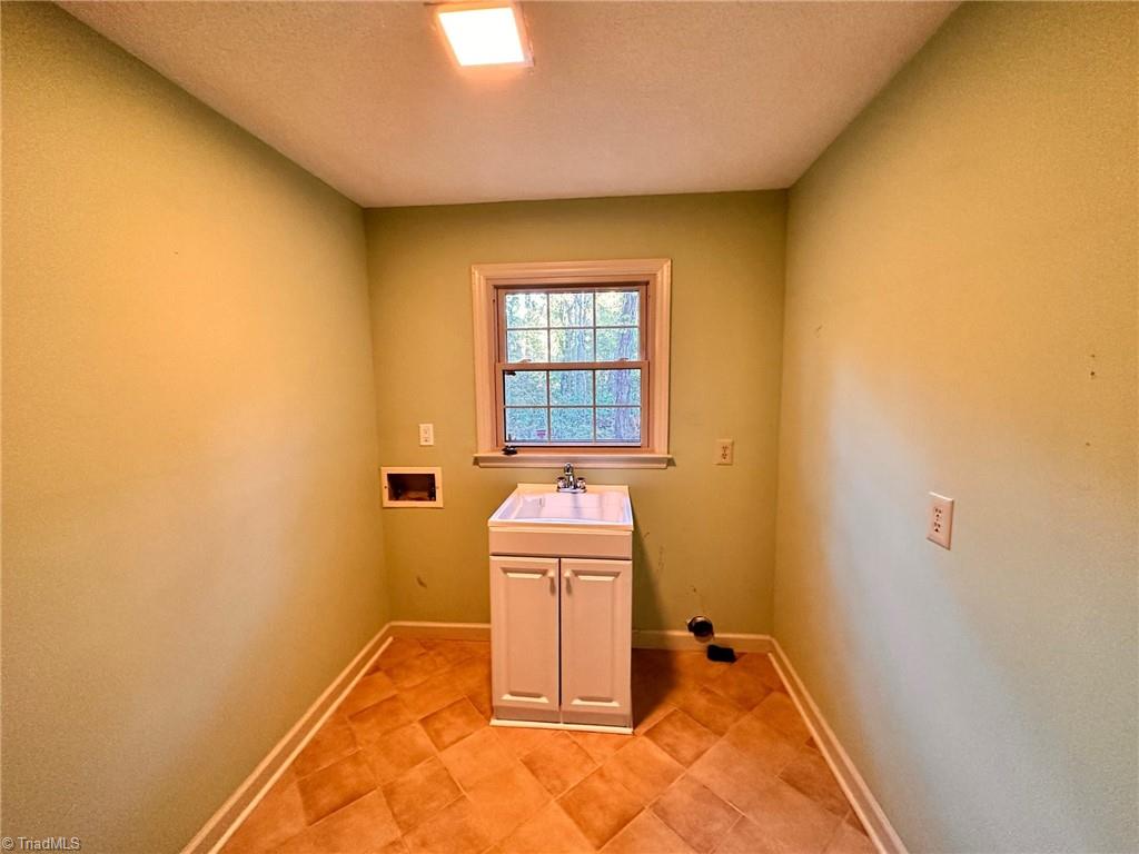 3415 Old Onslow Road Greensboro, NC 27407 - Photo 11 of 45 Laundry room - on main level