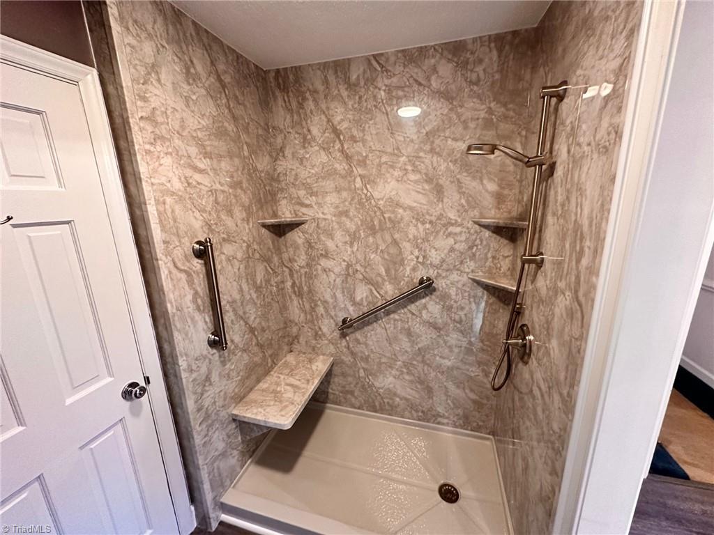 3415 Old Onslow Road Greensboro, NC 27407 - Photo 16 of 45 Primary shower with grab bars