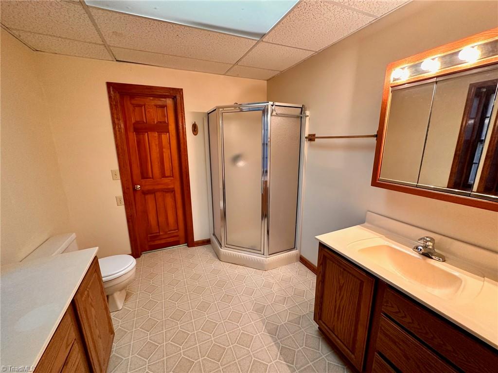 3415 Old Onslow Road Greensboro, NC 27407 - Photo 39 of 45 Full bathroom located in basement - not counted as finished SF since area leading to it is not finished
