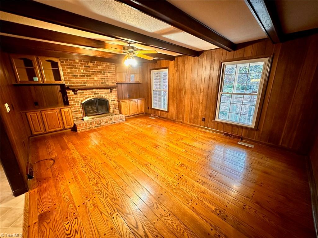 3415 Old Onslow Road Greensboro, NC 27407 - Photo 10 of 45 Great room with wood fireplace - View 2
