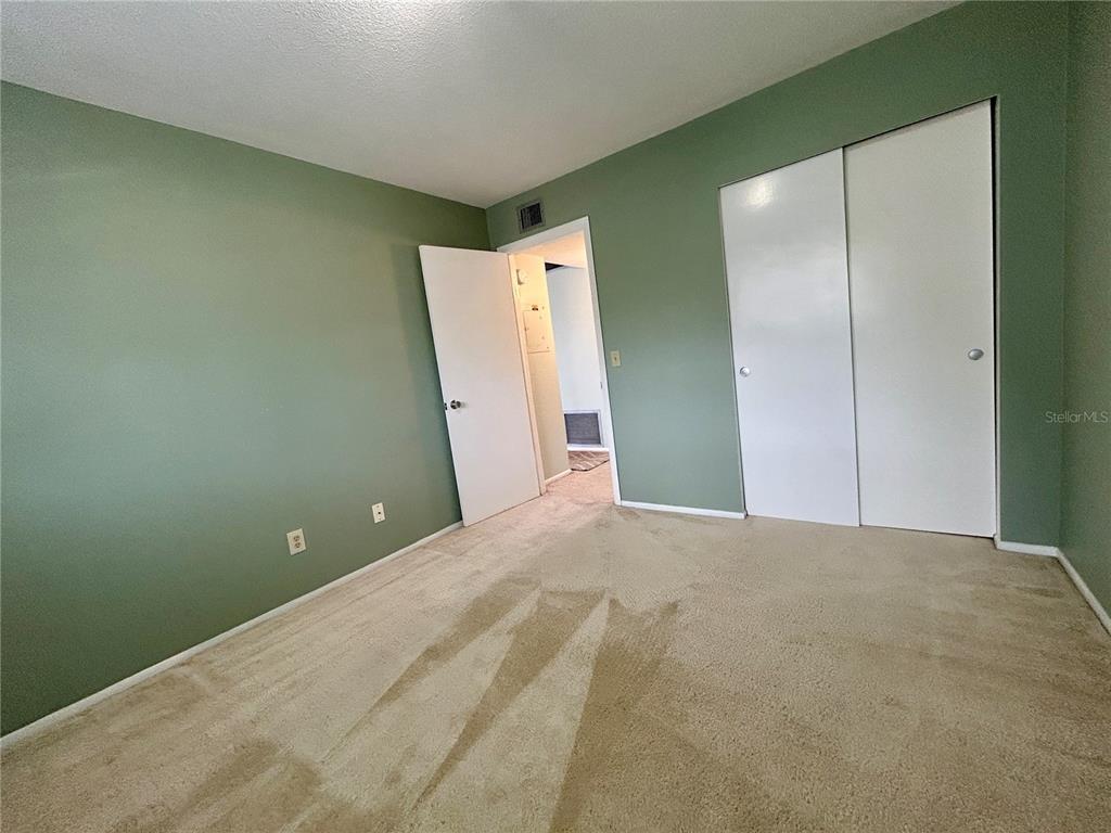 2072 Australia Way West, Unit 32 Clearwater, FL 33763 - Photo 23 of 47 a view of a room with an empty space