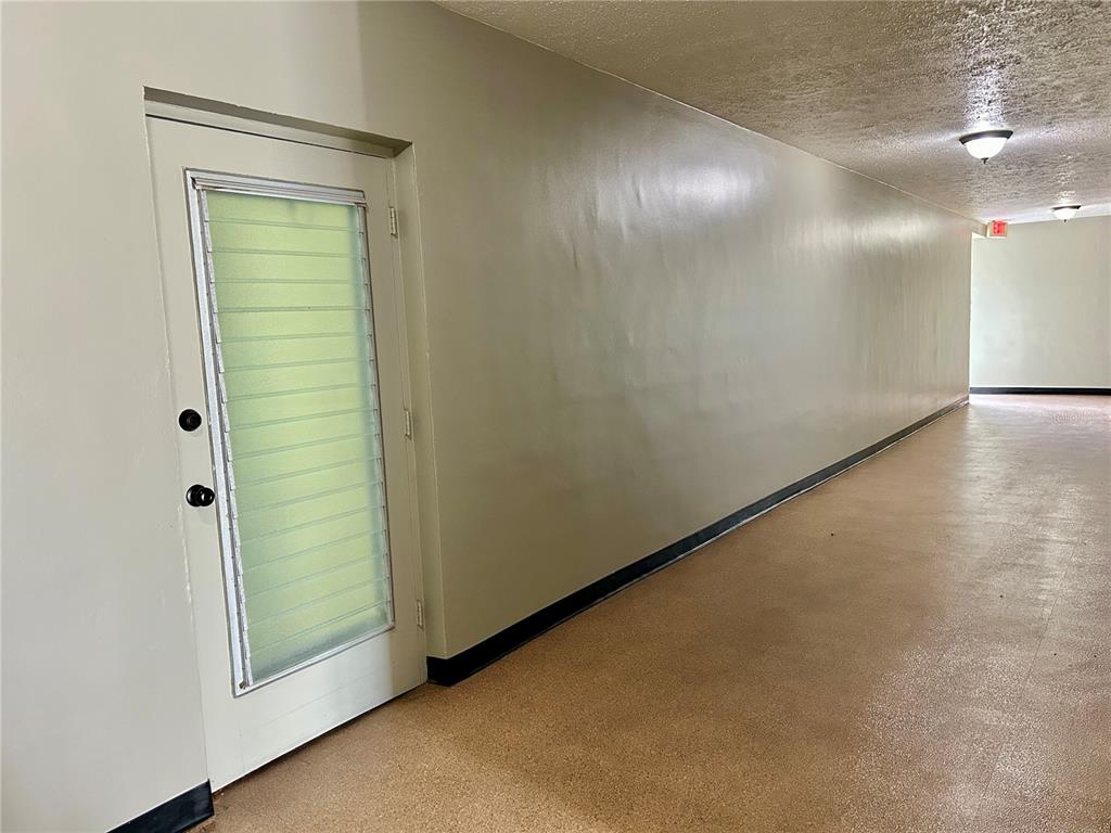 2072 Australia Way West, Unit 32 Clearwater, FL 33763 - Photo 25 of 47 a view of an empty room