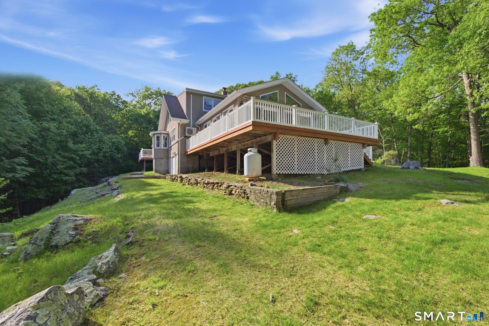 70 Mahoney Road Colchester, CT 06415 - Photo 33 of 40 a house view with a garden space