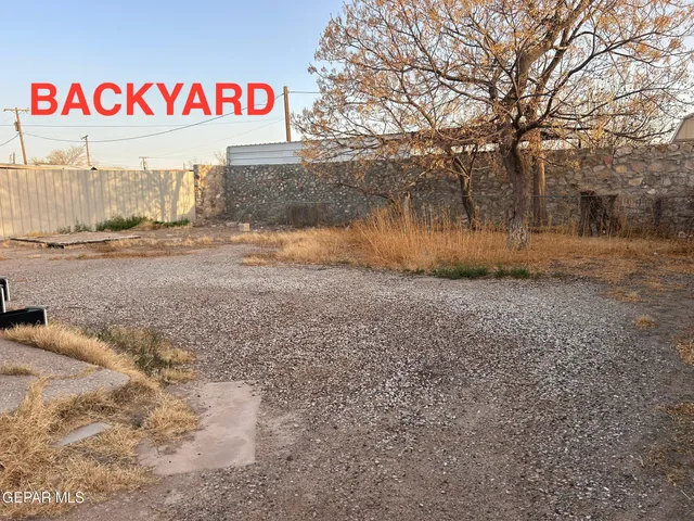 a street sign is next to a road