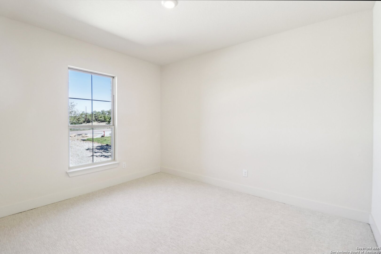 104 George Erath Blanco, TX 78606 - Photo 20 of 28 a view of an empty room and a window