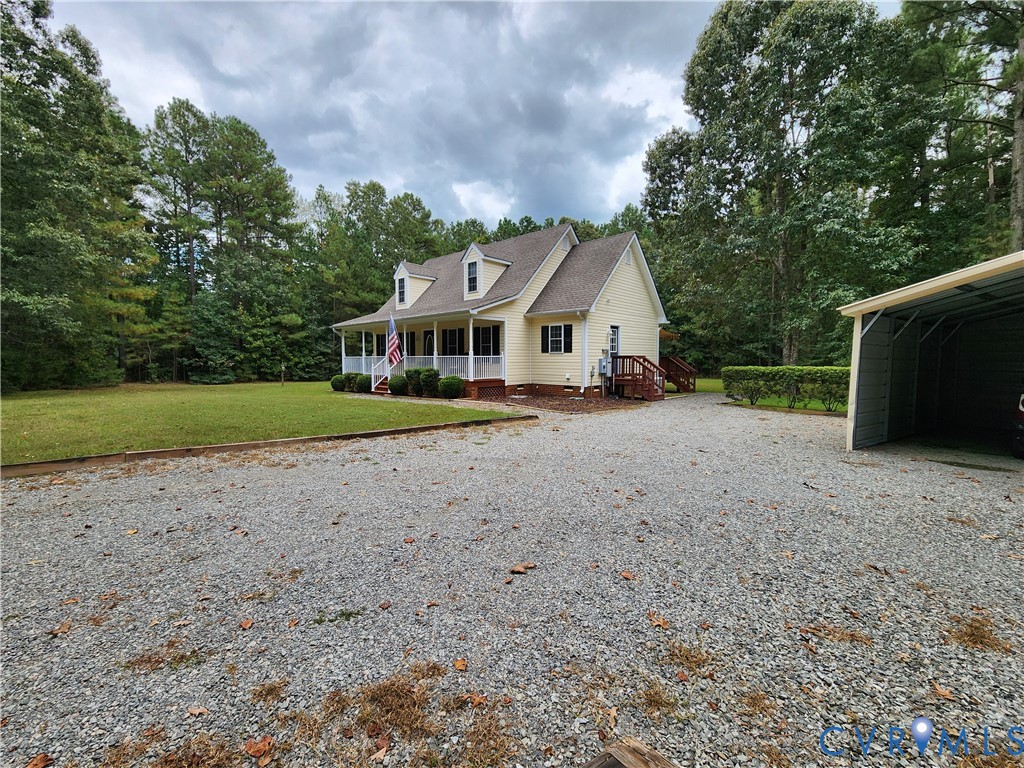 2744 Smokey Road Aylett, VA 23009 - Photo 63 of 72 Yellow siding exterior with white trim, covered fr