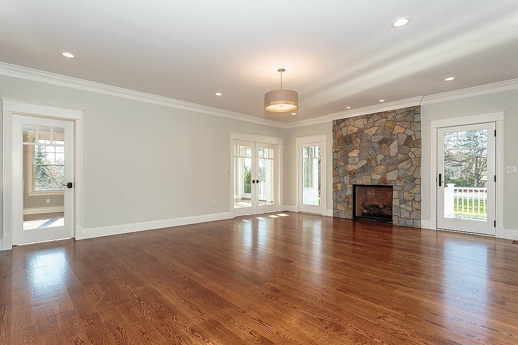 180 Ridge Street Winchester, MA 01890 - Photo 15 of 30 a view of an empty room with wooden floor and a window