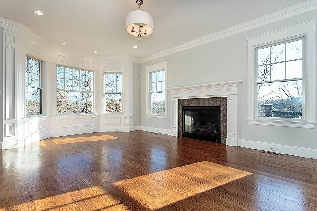 180 Ridge Street Winchester, MA 01890 - Photo 19 of 30 a view of an empty room with wooden floor and a window