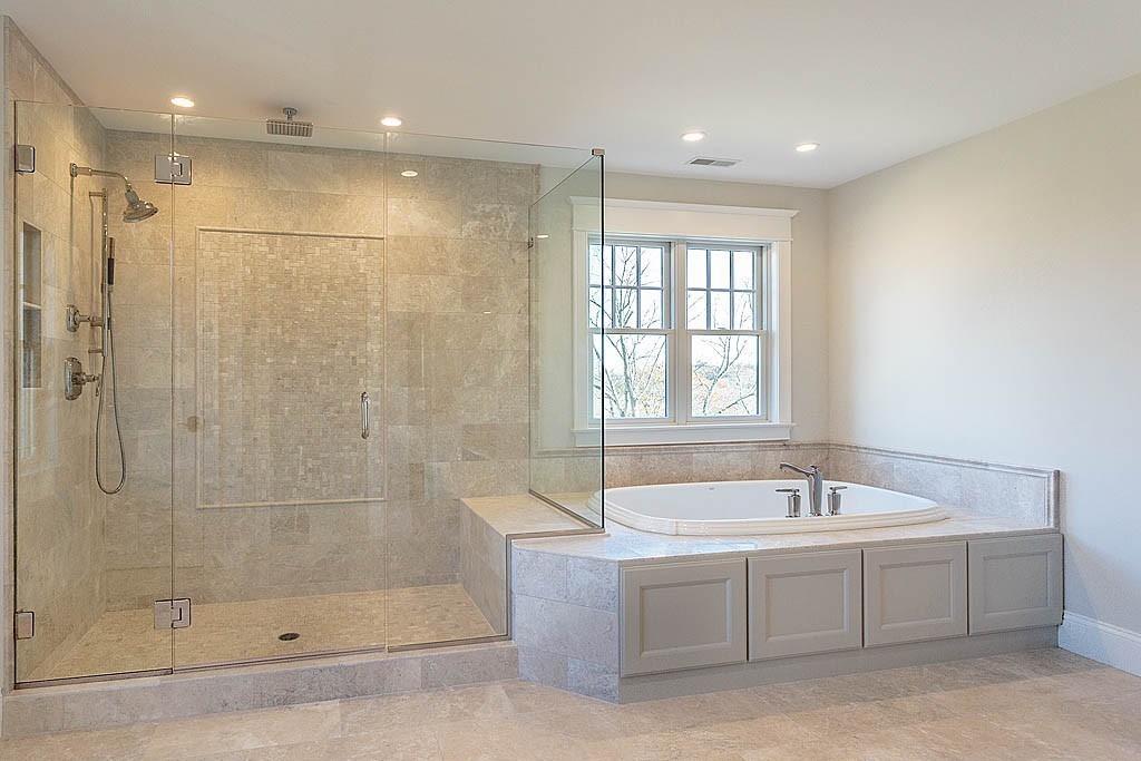 180 Ridge Street Winchester, MA 01890 - Photo 25 of 30 a bathroom with a bathtub and a shower